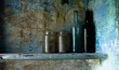 Old bottles blue walls